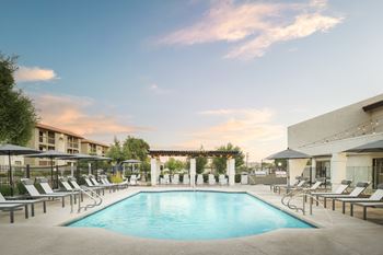 Two swimming pool areas with relaxing loungers and complimentary wi-fi
